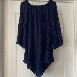 Off the shoulder dress.